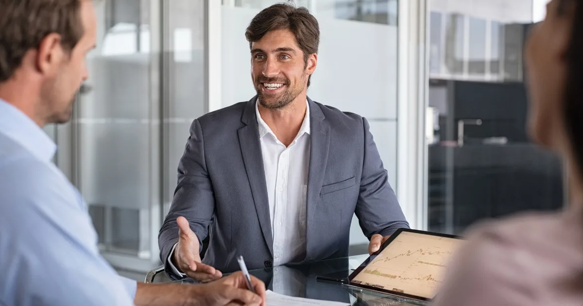 Couple celebrating a mortgage approval after an initial bank decline